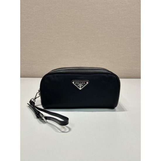 P230 new handbag 2NE063 co-ed models This practical and exquisite pouch is made of innovative recycled nylon fabric ReNylon with glossy leather details decorated with enameled triangular metal logo highlighting the brand's classic features Removable leath