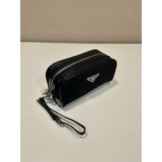P230 new handbag 2NE063 co-ed models This practical and exquisite pouch is made of innovative recycled nylon fabric ReNylon with glossy leather details decorated with enameled triangular metal logo highlighting the brand's classic features Removable leath