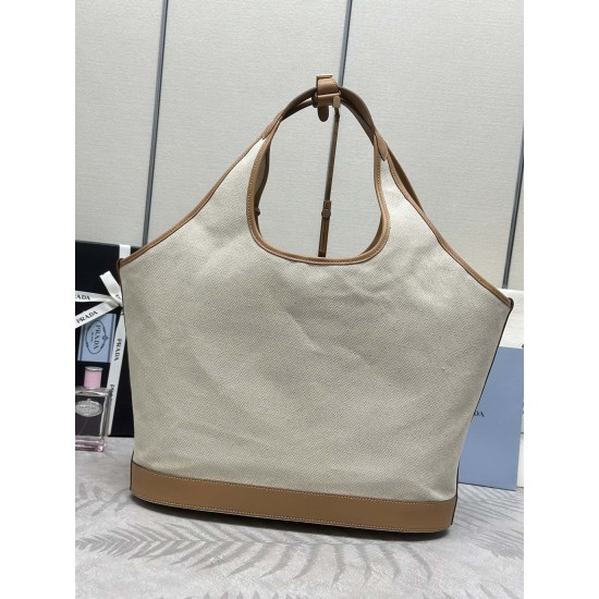 F5601bg472New large tote bagThis tote bag is made from a linen blend fabric that showcases a stylish sense of volume and sophisticated geometric shapes to show off its structured designCasual and versatileFull capacityEmbellished leather details add a tou